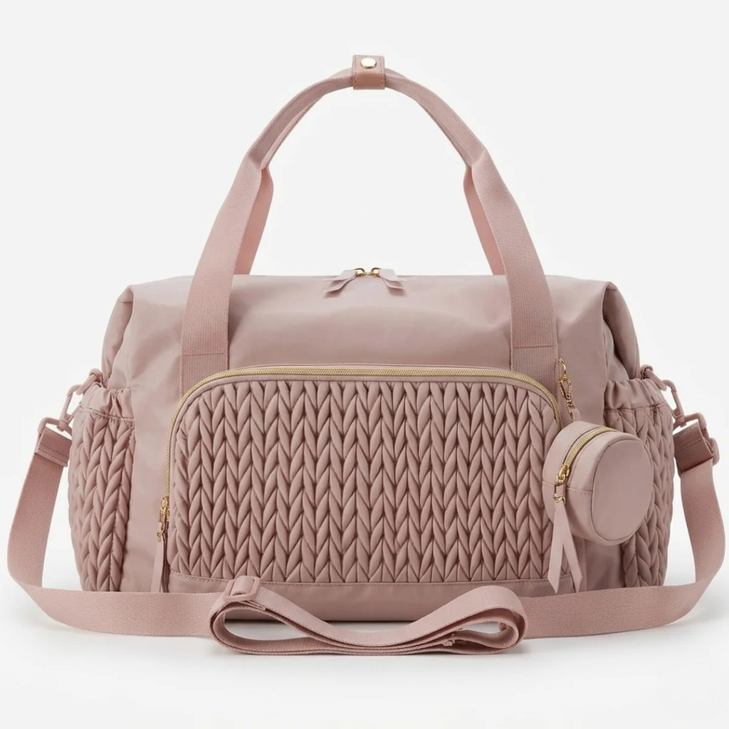 vue de face du grand sac à langer bébé tressé rose