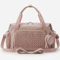 vue de face du grand sac à langer bébé tressé rose