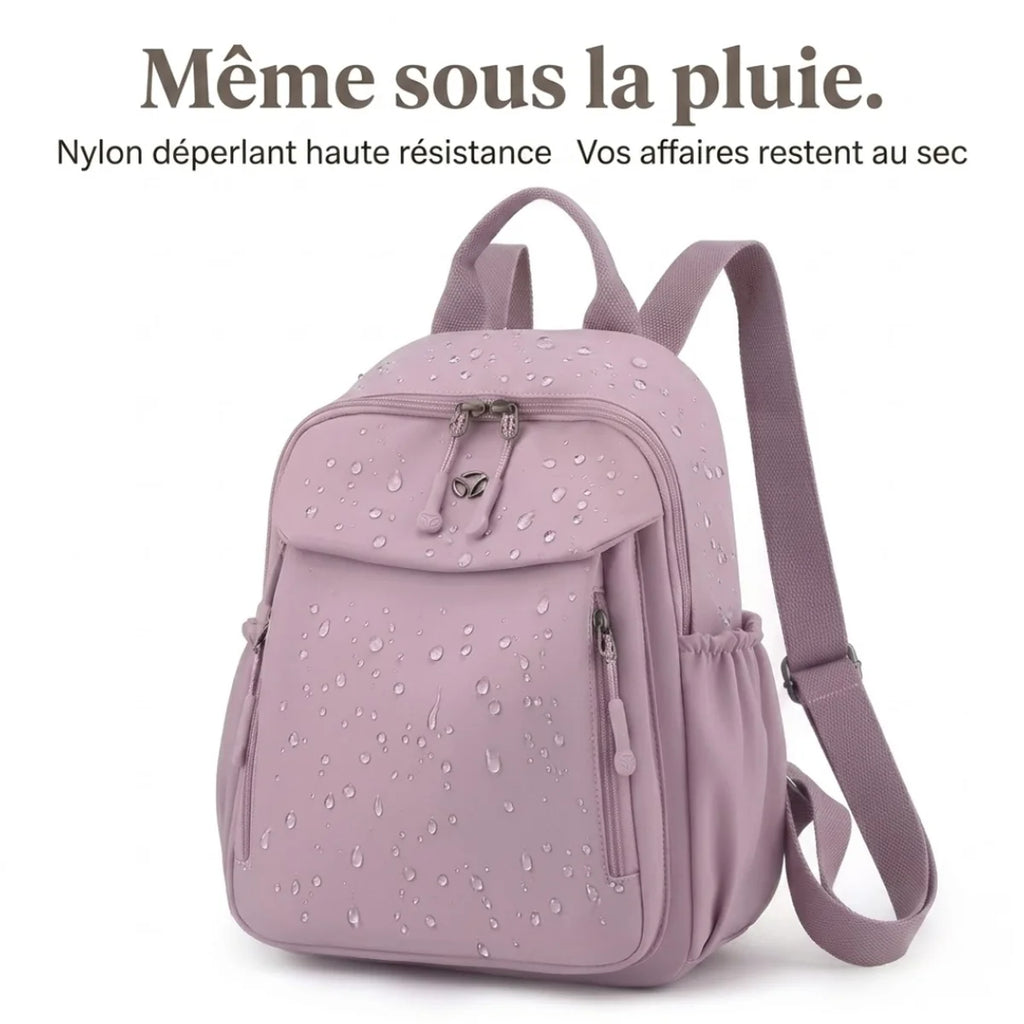 image montrant le sac avec des gouttes d'eau pour l'effet déperlant du Petit sac à langer classique
