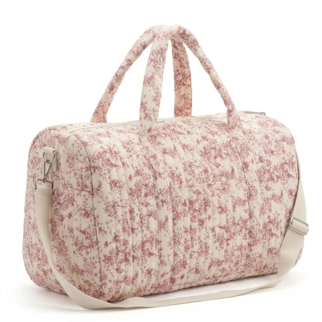 Vue du sac à langer fille floral grand format en trois-quarts arrière, rose.