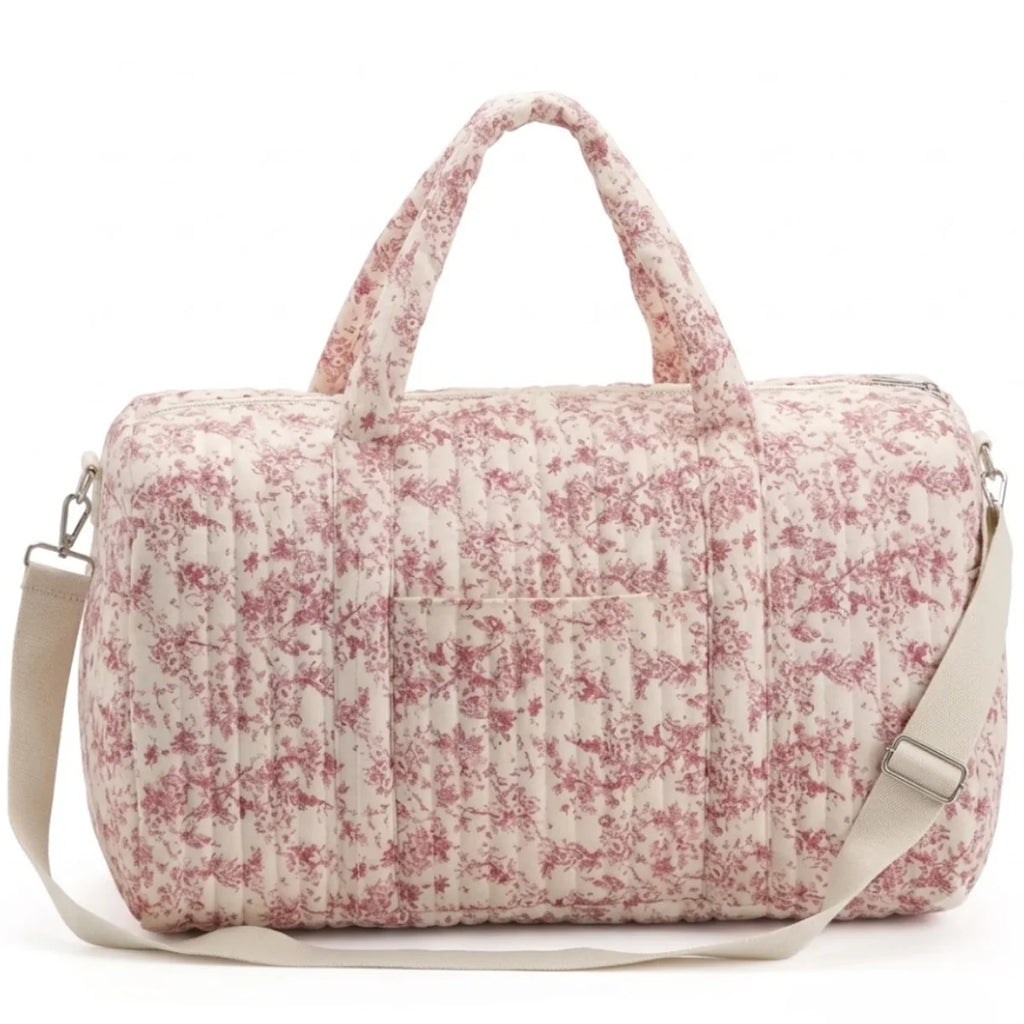 Vue du sac à langer fille floral grand format de face, imprimé rose.
