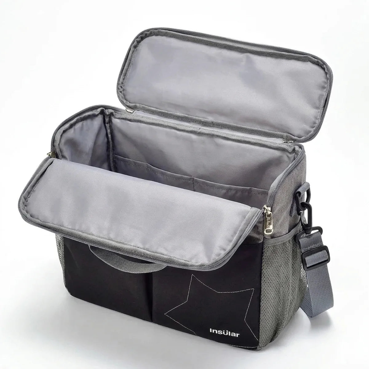Détail des poches extérieures organisées du sac à langer pour poussette