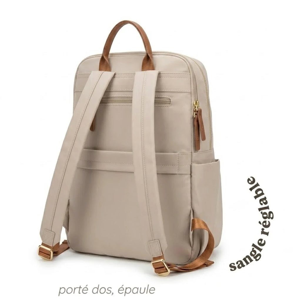 Vue du Sac à Langer Tissu Compact de dos, avec mise en avant de la sangle réglable pour un portage dos ou épaule.