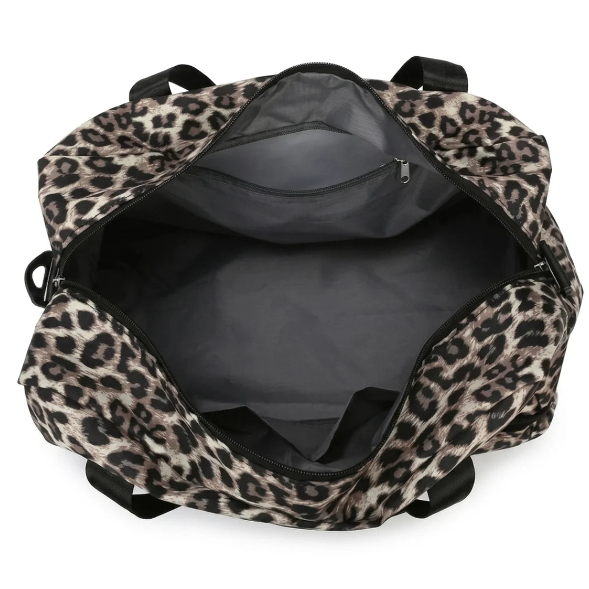 Intérieur du sac à langer léopard grande taille, compartiment principal ouvert, poche zippée intérieure